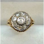 18ct gold and rose diamond ring set with 9 old rose diamonds weight of ring 5.2g