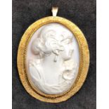 14ct gold mounted cameo brooch / pendant hallmarked on pin 585 measures approx 49mm by 40mm not incl