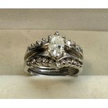 White gold and diamond ring large central diamond measures approx 7.5mm by 5mm set with small diamon