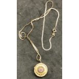 9ct locket with chain set with garnets and seed-pearls hallmarked on back 9.375 locket measu