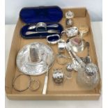 Collection of silver item includes christening set boxed napkin rings cruet set etc