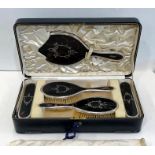 Boxed antique silver and tortoiseshell brush set London silver hallmarks consists of mirror and 4 br