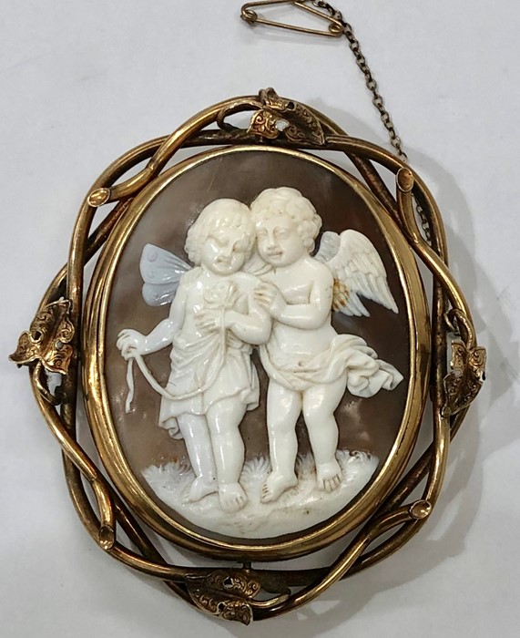 Large victorian cameo brooch gold coloured metal mount not hallmarked with carved cameo of angels in