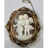 Large victorian cameo brooch gold coloured metal mount not hallmarked with carved cameo of angels in