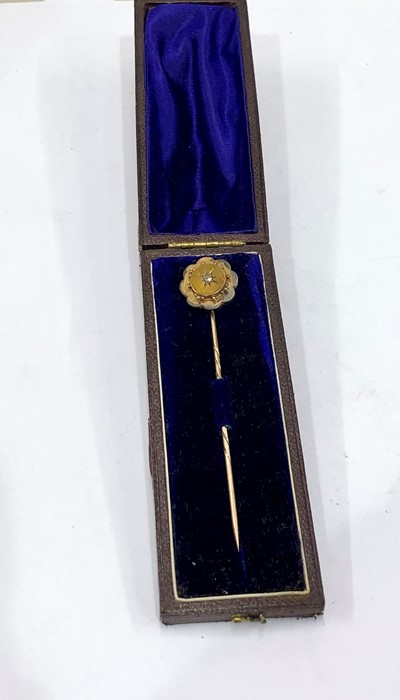 original boxed gold and diamond stick pin mesures approx 7.5 cm long weight 4g not hallmarked