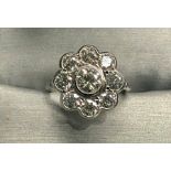 18ct White gold diamond cluster ring centre stone measures approx 6mm dia with 8 x approx 4mm dia di