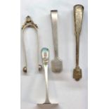 4 silver items includes 3 silver sugar tongues and enamel feeding spoon