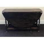 Period oak gate leg table draw at one end