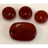 4 large cherry amber bakelite type beads the large bead has good internal streaking