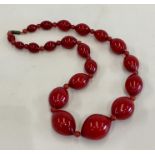 String of unusual shaped cherry amber faturan bead necklace weight 80g beads have great internal str