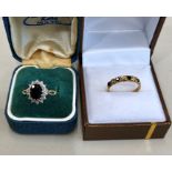 2 vintage ladies dress rings includes 18ct gold diamond and sapphire and 9ct gold blue stone ring to