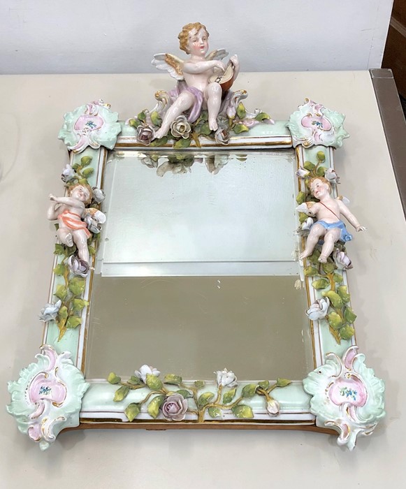 Ornate Dresden Sitzendorf standing mirror with floral and cherub decoration