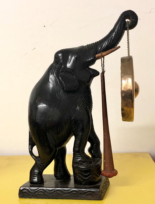 Vintage carved wooden elephant table gong missing one tusk measures approx 42cm tall