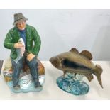 Royal Doulton a good catch fisherman figurine and a Beswick large-mouthed black bass fish figurine N