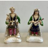 Pair of fine early staffordshire figures of turkish man and woman
