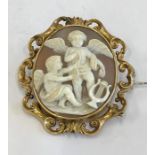 Victorian cameo brooch with cherubs set in yellow metal frame cameo measures approx 4.5cm by 3.5cm
