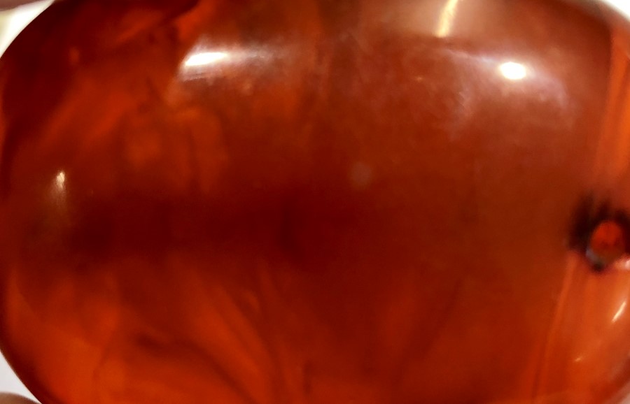 4 large cherry amber bakelite type beads the large bead has good internal streaking - Image 3 of 6