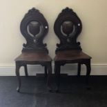 Pair of mahogany victorian shield back hall chairs