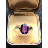 Vintage 18ct gold and Amethyst dress ring large central amethyst stone measures approx 11mm by 8mm s