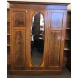 Edwardian flamed mahogany 3 door wardrobe with flared cornice