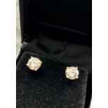 Pair of diamond stud earrings brilliant cut diamonds total weight of diamonds 2.08 ct