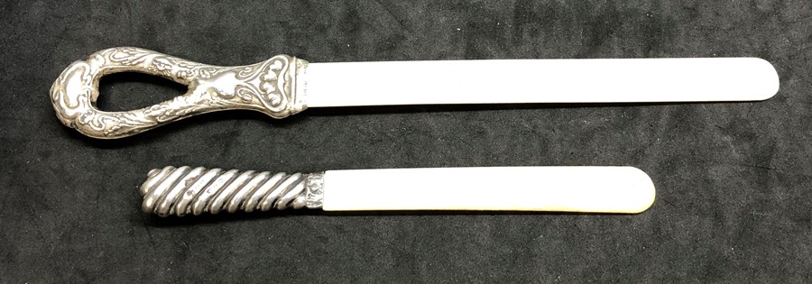 2 Antique silver mounted letter openers largest measures approx 27.5cm long