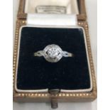 Art deco 18ct gold and diamond ring set with central diamond that measures approx 4.5mm dia