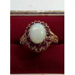 9ct gold opal and ruby dress ring weight 4.5g