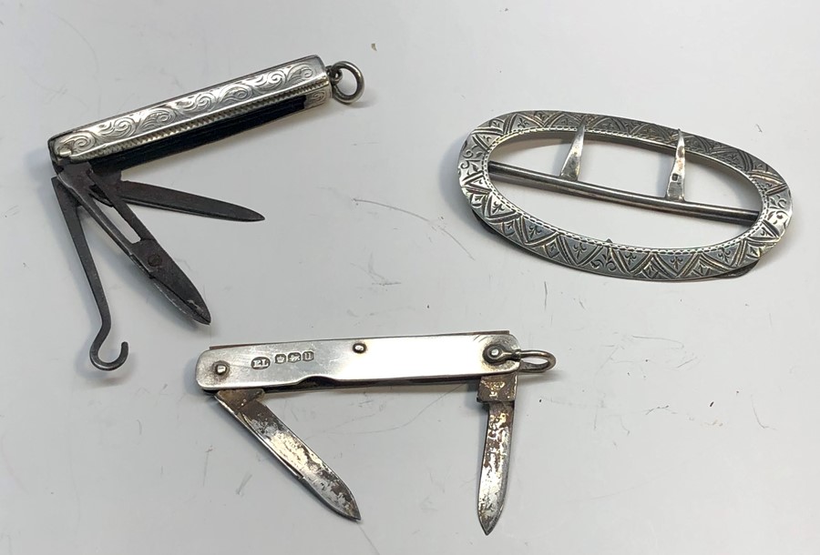 selection of 3 silver items includes 2 silver mounted pen knives one with scissors and button hook ,