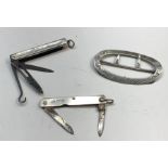 selection of 3 silver items includes 2 silver mounted pen knives one with scissors and button hook ,