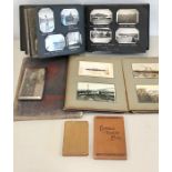 Collection of WW2 and ww1 photographs postcards including cigarette case and books