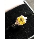 Platinum diamond and yellow sapphire ring hallmarked plat set with large central yellow sapphire tha