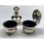 silver cruet set with blue glass liners Birmingham silver hallmarks