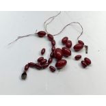 Cherry amber / bakelite bead necklace good internal streaking shaped beads largest measures approx