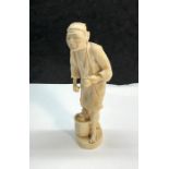 apanese ivory figure glue marks to hand missing something from hand