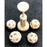 19th Early 20th century Chinese ivory puzzle ball on stand with 3 extra puzzle balls
