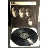 The Beatles with the beatles Vinyl Record looks in very good condition