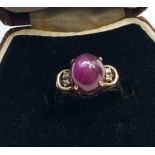 14ct gold and diamond stone set ring possibly ruby weight 3.6g