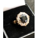 18ct gold diamond and sapphire ring hallmarked 18ct with large central sapphire that measures approx
