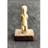 17th century ivory Faun knife handle mounted on a later pedestal base age related cracks and wear me