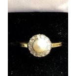 Vintage pearl and rose diamond ring 18ct gold not hallmarked set with central pearl and old cut rose