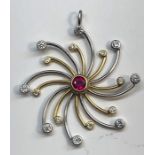 18ct yellow and white gold diamond and ruby star pendant set with central ruby measures approx 4mm