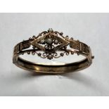 victorian gold and seed-pearl bangle /bracelet front set with seed-pearls not hallmarked but acid te