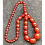 long cherry amber bakelite bead necklace graduated beads largest measures approx 27mm by 23mm length