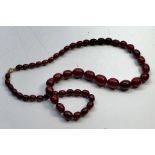 Cherry amber / bakelite bead necklace good internal streaking measures approx 57cm long graduated be