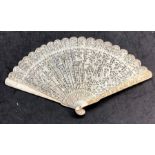 Antique 19th century Chinese canton ivory fan with ornate all over carving lenght 19cm good overall