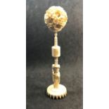 large Chinese carved ivory puzzle ball on stand, height 28cm