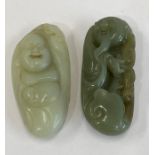 2 chinese carved jade buddha figures each measures approx 8 and 8.5 cm long