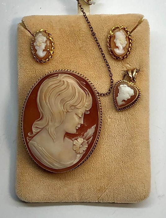 9ct gold mounted cameo brooch ,earrings and pendant .brooch measures approx 46mm by37mm