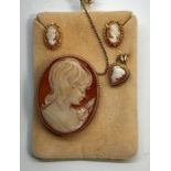 9ct gold mounted cameo brooch ,earrings and pendant .brooch measures approx 46mm by37mm